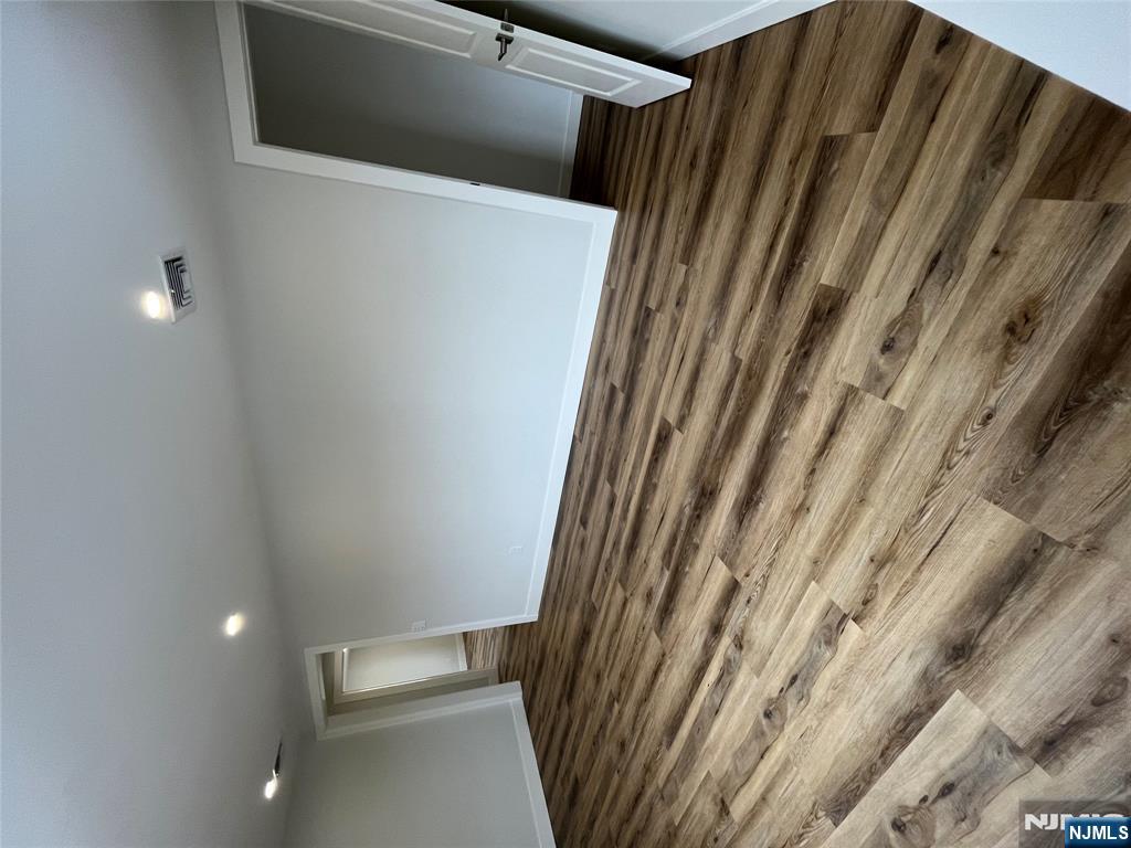17 Market Street, Unit 2 Garfield, NJ 07026 - Photo 4 of 16 a view of wooden floor