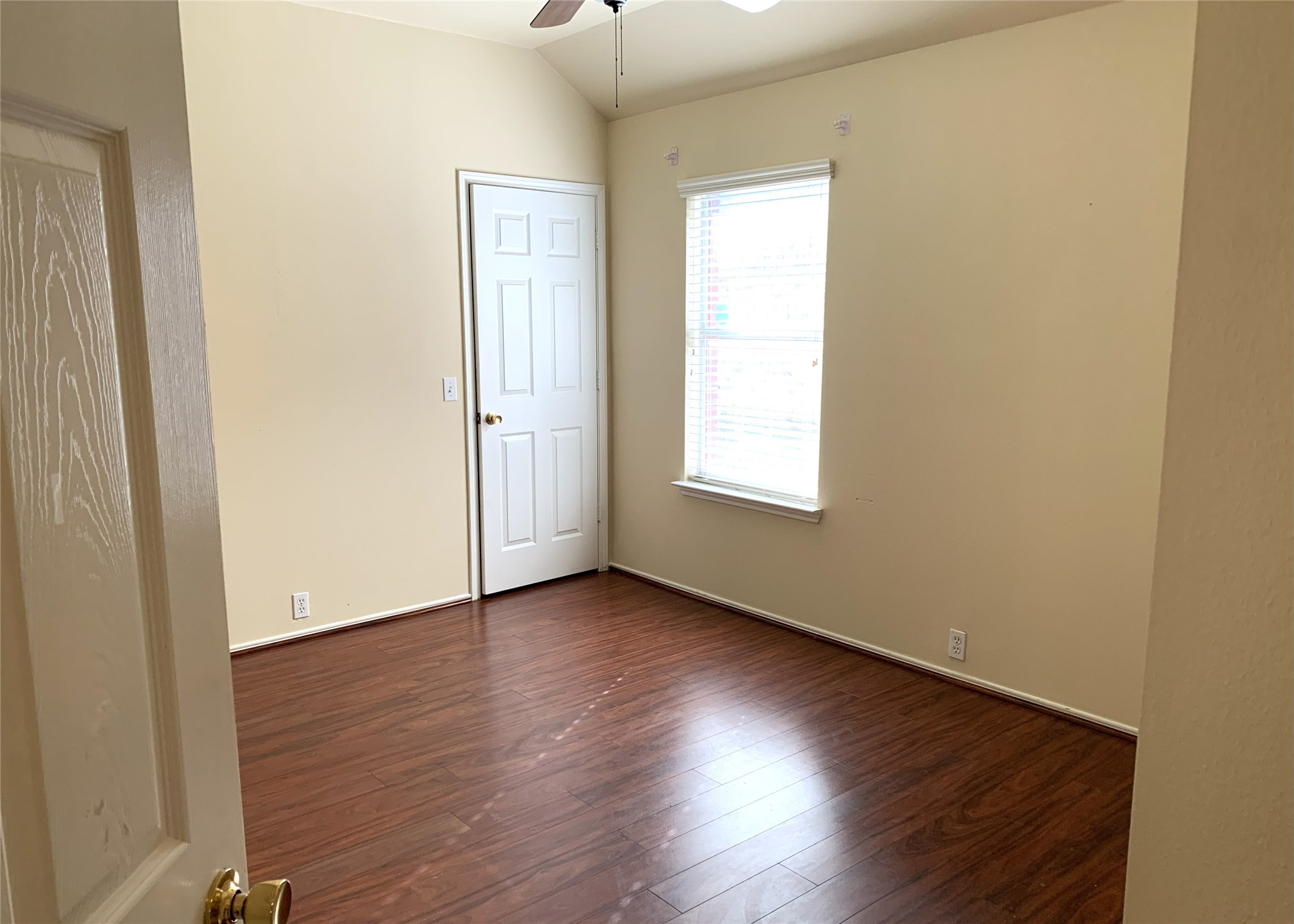11014 Redhaven Court Houston, TX 77065 - Photo 16 of 20 an empty room with wooden floor and windows