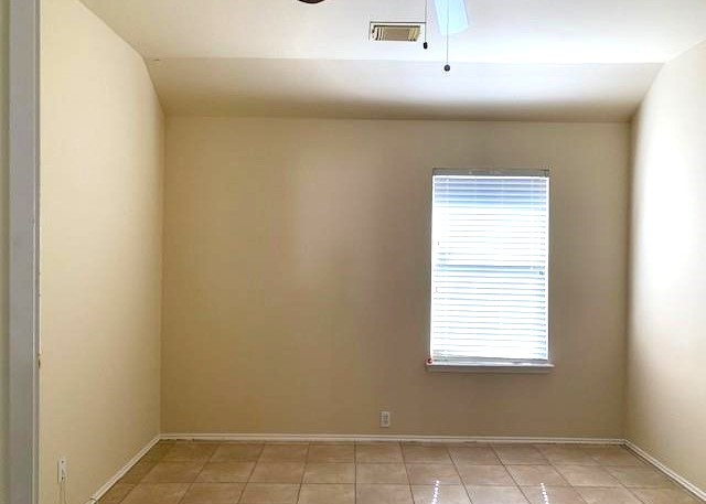11014 Redhaven Court Houston, TX 77065 - Photo 17 of 20 a view of an empty room with a window