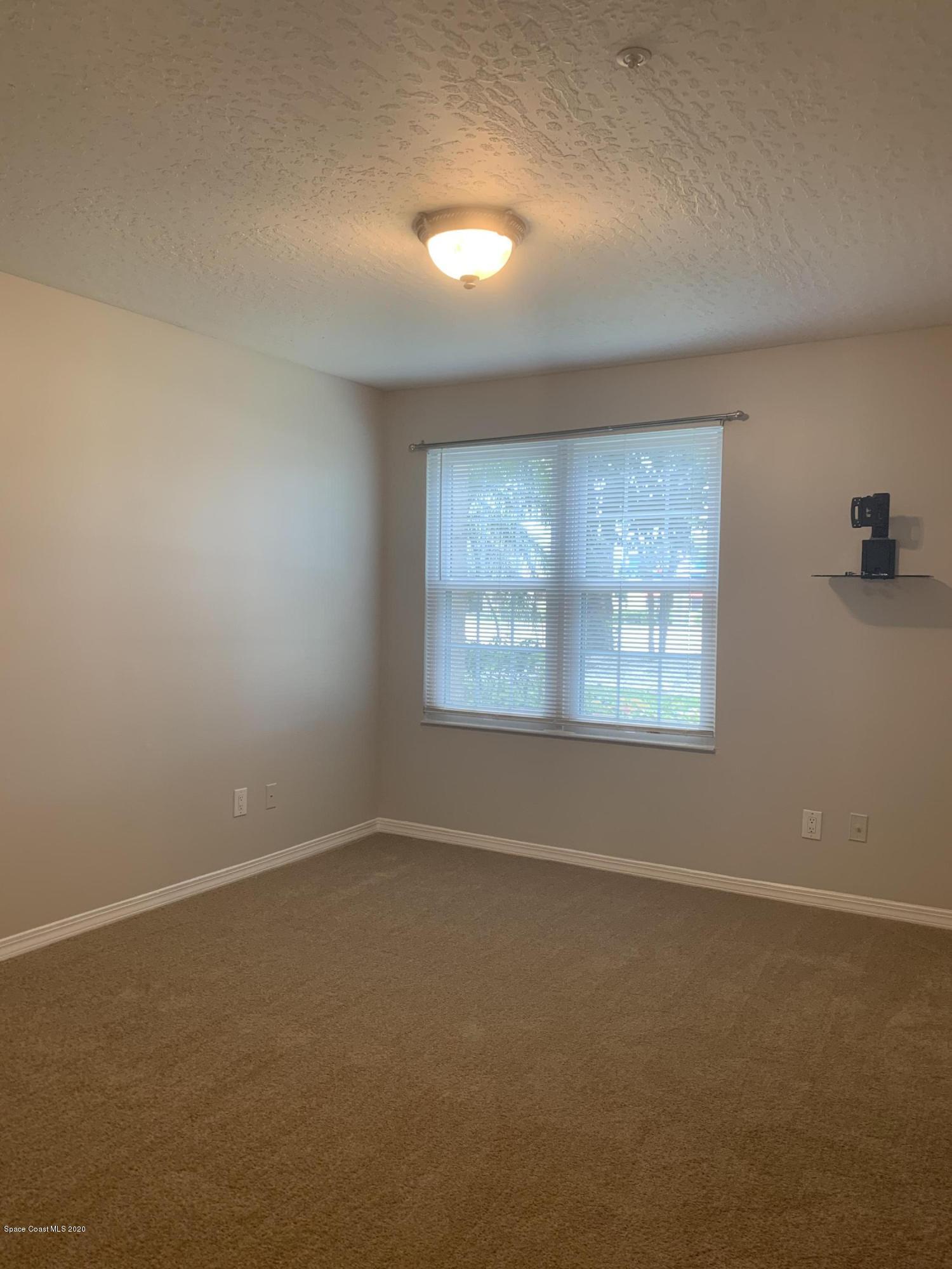 7667 North Wickham Road, Unit 306 Melbourne, FL 32940 - Photo 4 of 26 IMG_3573