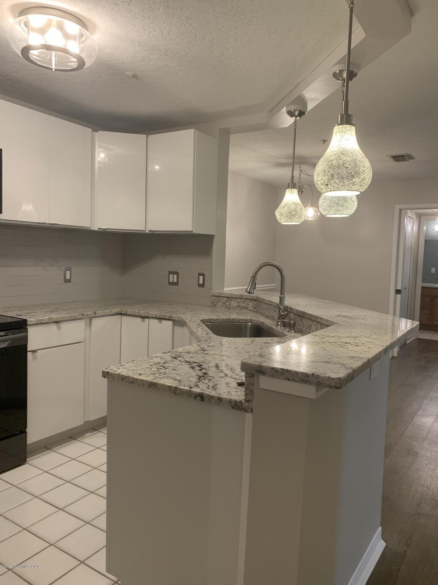 7667 North Wickham Road, Unit 306 Melbourne, FL 32940 - Photo 9 of 26 IMG_3578