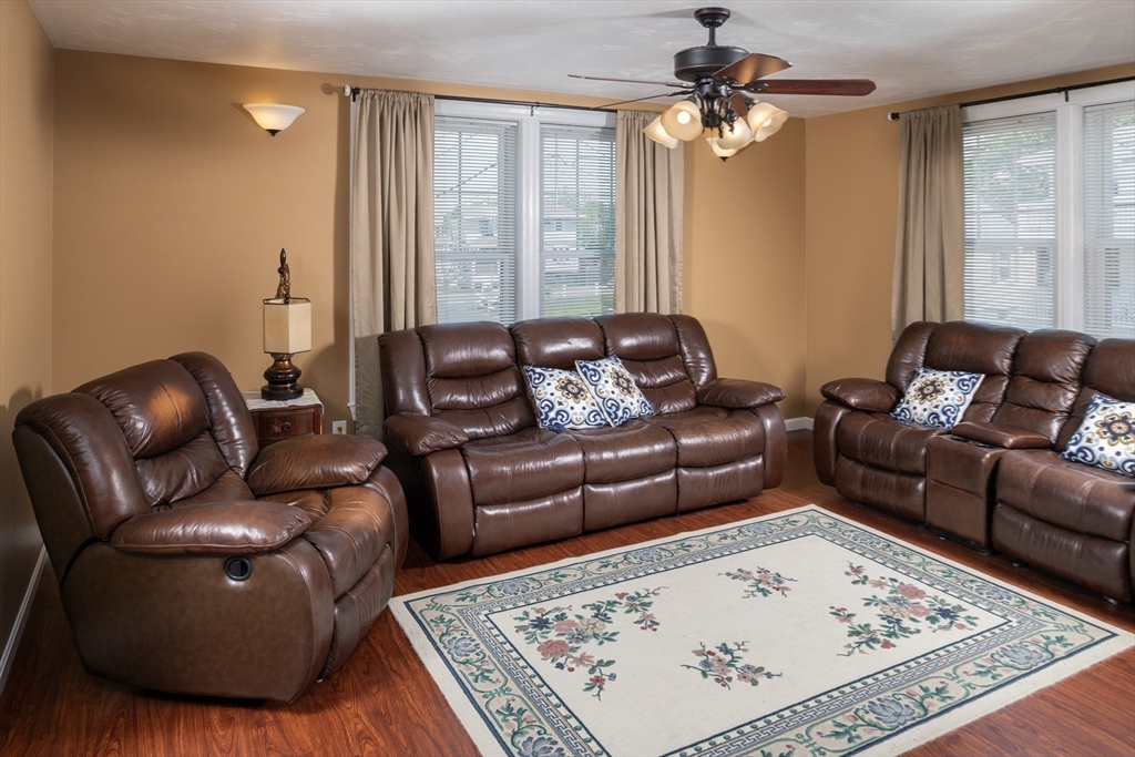 67 Newport Road Hull, MA 02045 - Photo 5 of 26 a living room with furniture and a rug