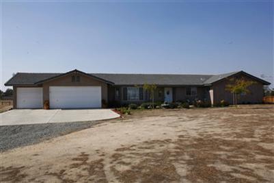 17136 La Canada Road Madera, CA 93636 - Photo 1 of 14 Front elevation of home. This home sits atop a small rise for maximum views.
