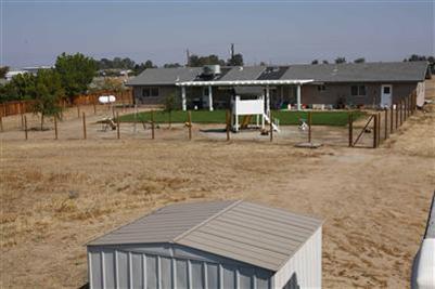 17136 La Canada Road Madera, CA 93636 - Photo 14 of 14 A look back at the house from the middle of the property.