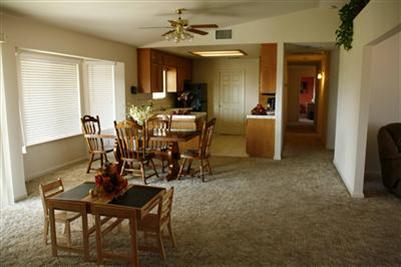 17136 La Canada Road Madera, CA 93636 - Photo 5 of 14 A look back into the dining and kitchen. Look at all the open space. What could you do here???