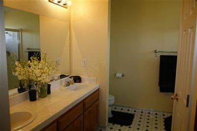 17136 La Canada Road Madera, CA 93636 - Photo 10 of 14 The master bathroom. The shower in this bathroom has double shower heads.... one on each end of the shower. Relax and enjoy!