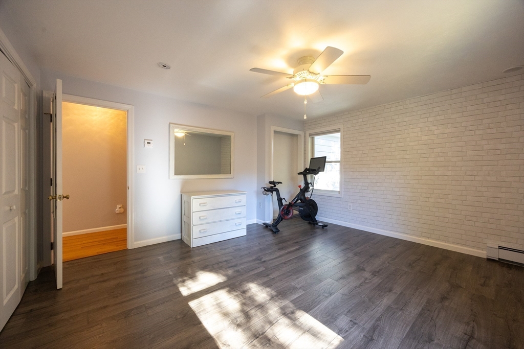 27 Fowler Street Upton, MA 01568 - Photo 22 of 36 wooden floor in an empty room with a window