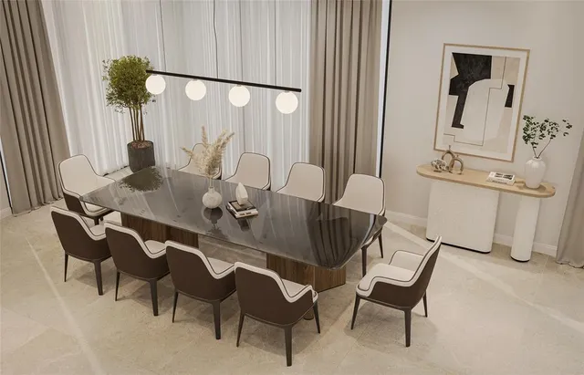 a view of a dining room with furniture and a window