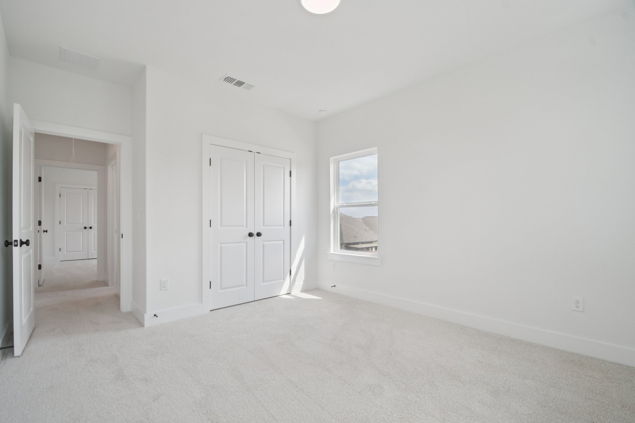 1660 Cardinal Lane Round Rock, TX 78681 - Photo 32 of 35 a view of an empty room and a bathroom