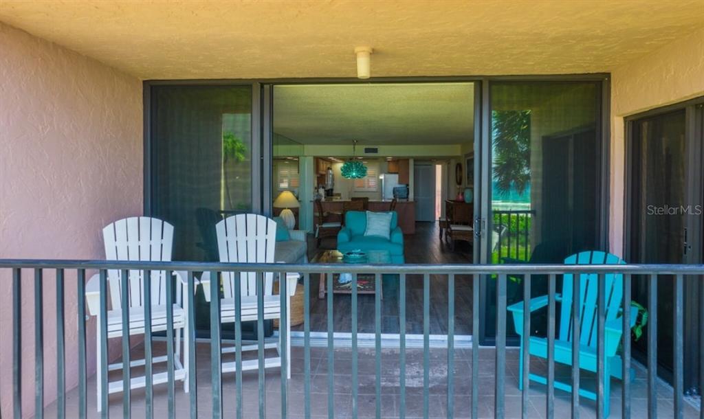 6480 Midnight Pass Road, Unit 316 Sarasota, FL 34242 - Photo 21 of 23 Terrace that offers a full view of the Gulf