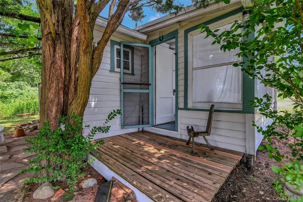 a house with trees in front of it