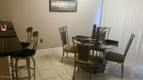 a view of a workspace with furniture