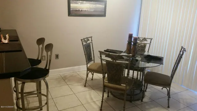 a view of a workspace with furniture