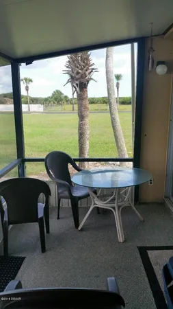 a view of a outdoor space with furniture