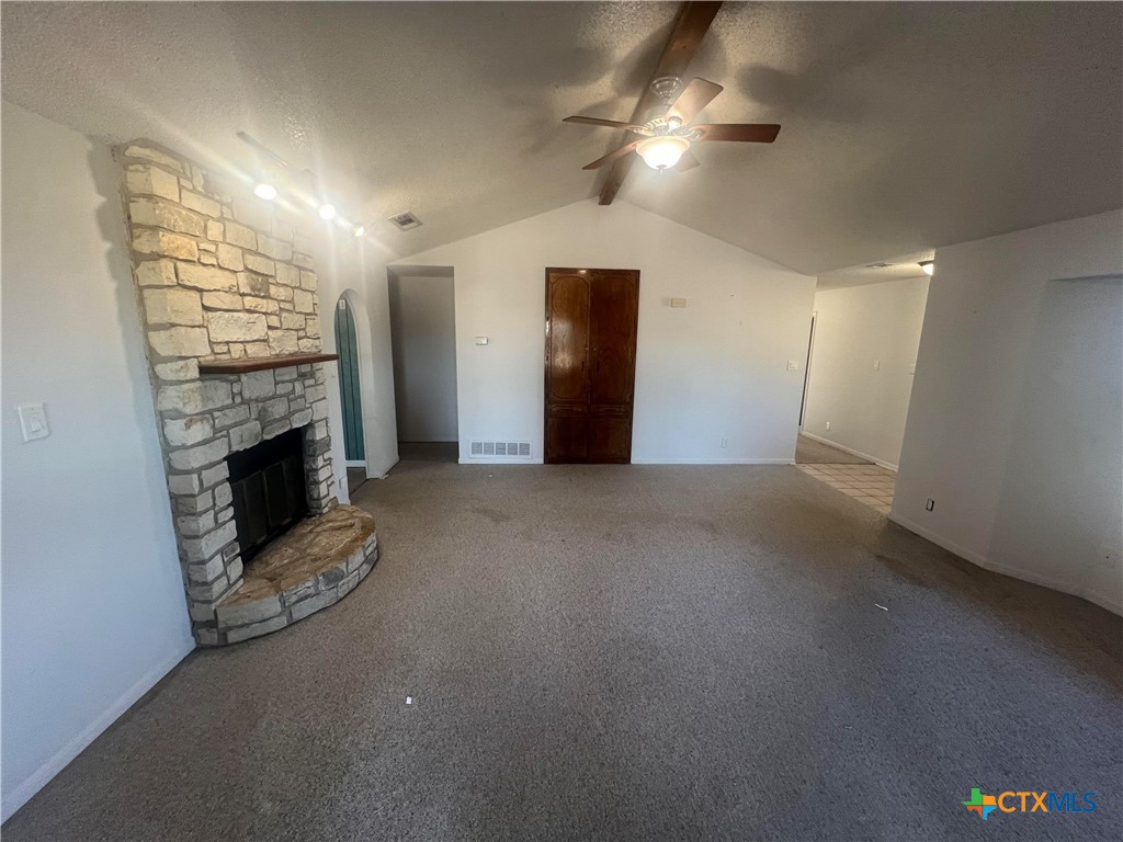 20239 Stillman Valley Road Florence, TX 76527 - Photo 11 of 35 a view of a livingroom with a fireplace