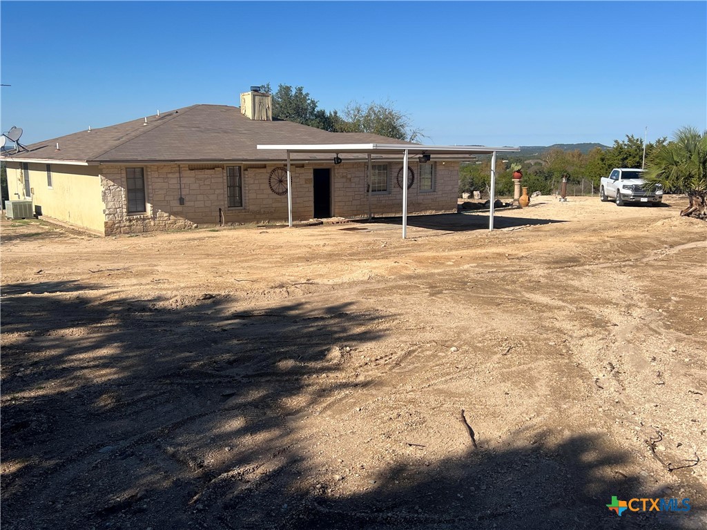 20239 Stillman Valley Road Florence, TX 76527 - Photo 2 of 35 a outdoor view of house with yard