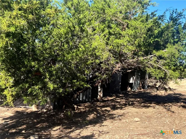 a view of a backyard of house