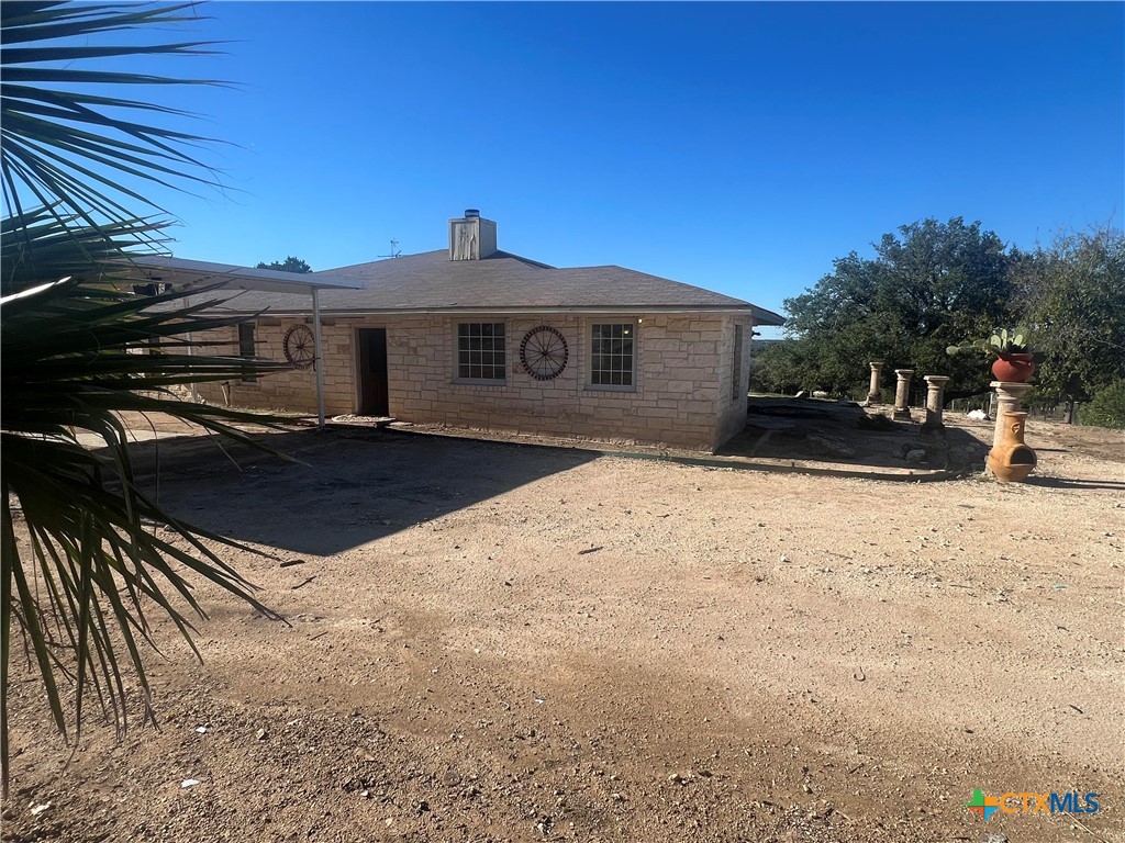 20239 Stillman Valley Road Florence, TX 76527 - Photo 4 of 35 a front view of a house with a yard