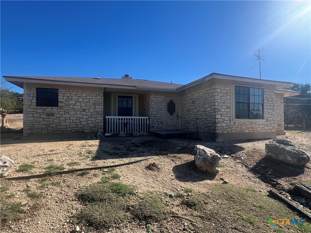 20239 Stillman Valley Road Florence, TX 76527 - Photo 5 of 35 a view of a back yard of the house