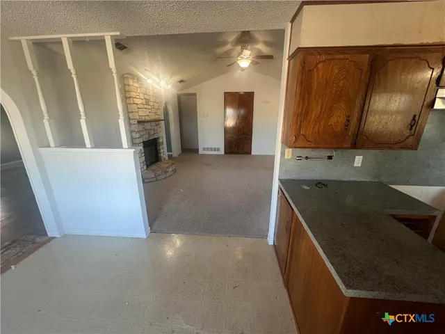 a view of a livingroom with a fireplace