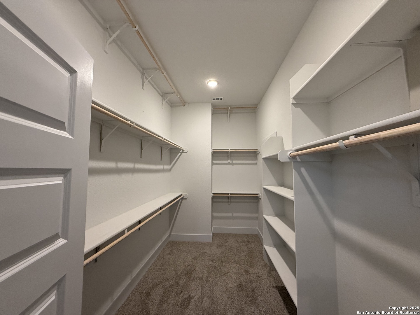 423 Glenwood Ranch Cibolo, TX 78108 - Photo 11 of 33 a view of walk in closet