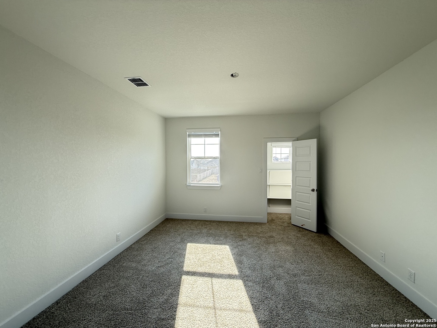 423 Glenwood Ranch Cibolo, TX 78108 - Photo 15 of 33 an empty room with a window