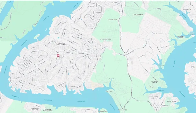 a white vase with flowers on it