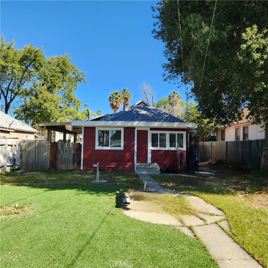 4280 9th Street Riverside, CA 92501 - Photo 3 of 11 a front view of a house with garden