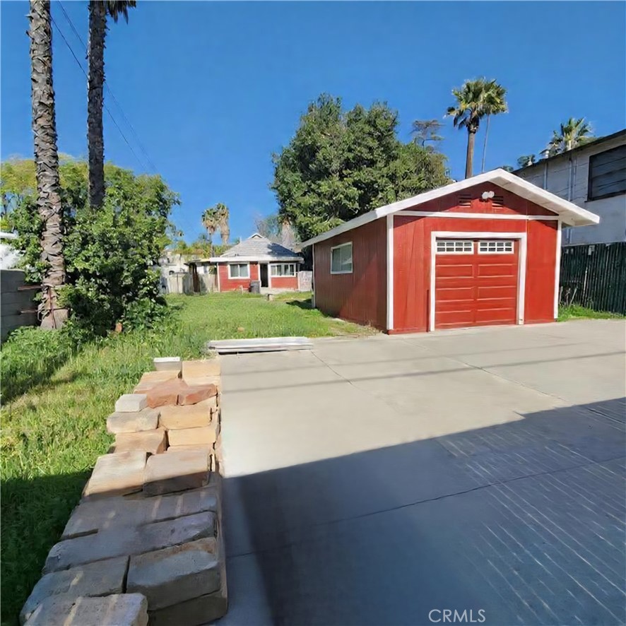 4280 9th Street Riverside, CA 92501 - Photo 4 of 11 a front view of a house with a yard
