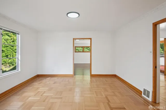 a kitchen with stainless steel appliances a refrigerator sink and cabinets