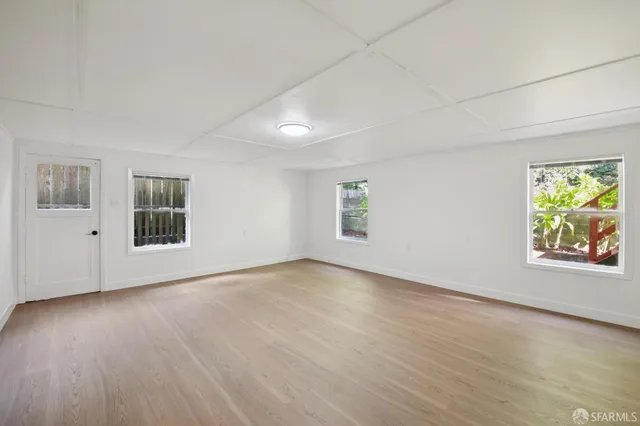 a backyard of a house with lots of green space