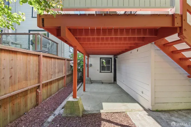 a view of a room with wooden walls