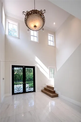 a view of workspace with furniture and window