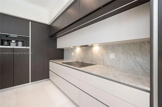 a view of a room with wooden floor and windows