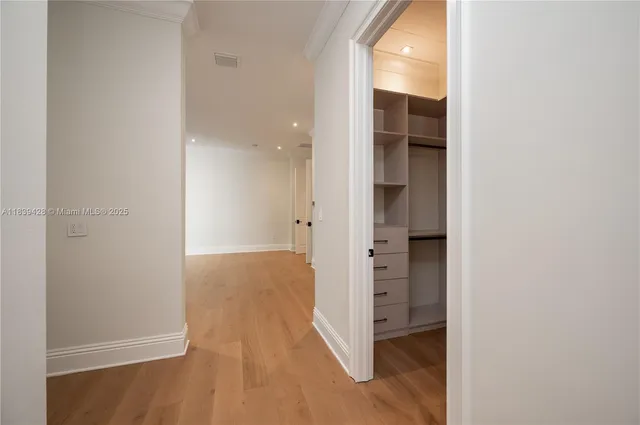 a view of a bathroom with a glass door shower
