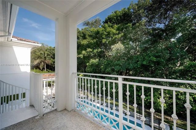 a view of an outdoor space and tennis court