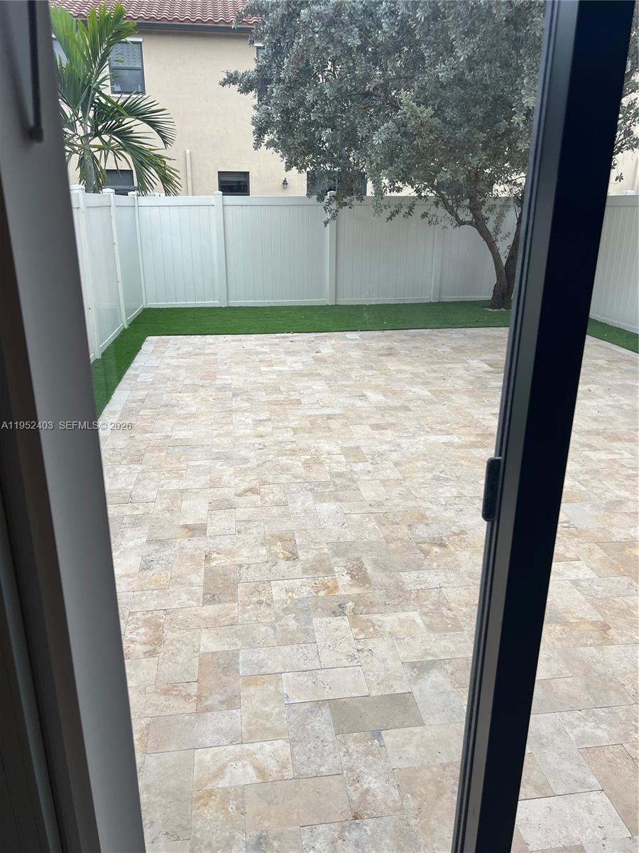 3344 West 91st Terrace, Unit 3344 Hialeah, FL 33018 - Photo 11 of 22 a view of a backyard