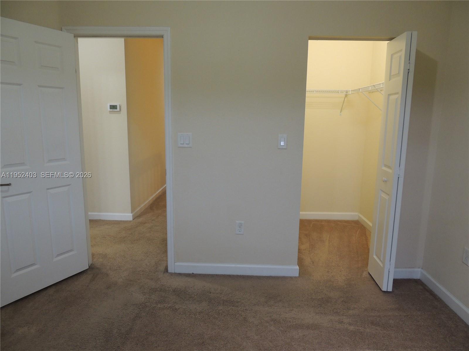 3344 West 91st Terrace, Unit 3344 Hialeah, FL 33018 - Photo 18 of 22 a view of an empty room