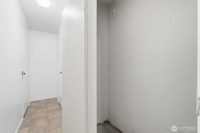 a front view of a house with a yard and a garage