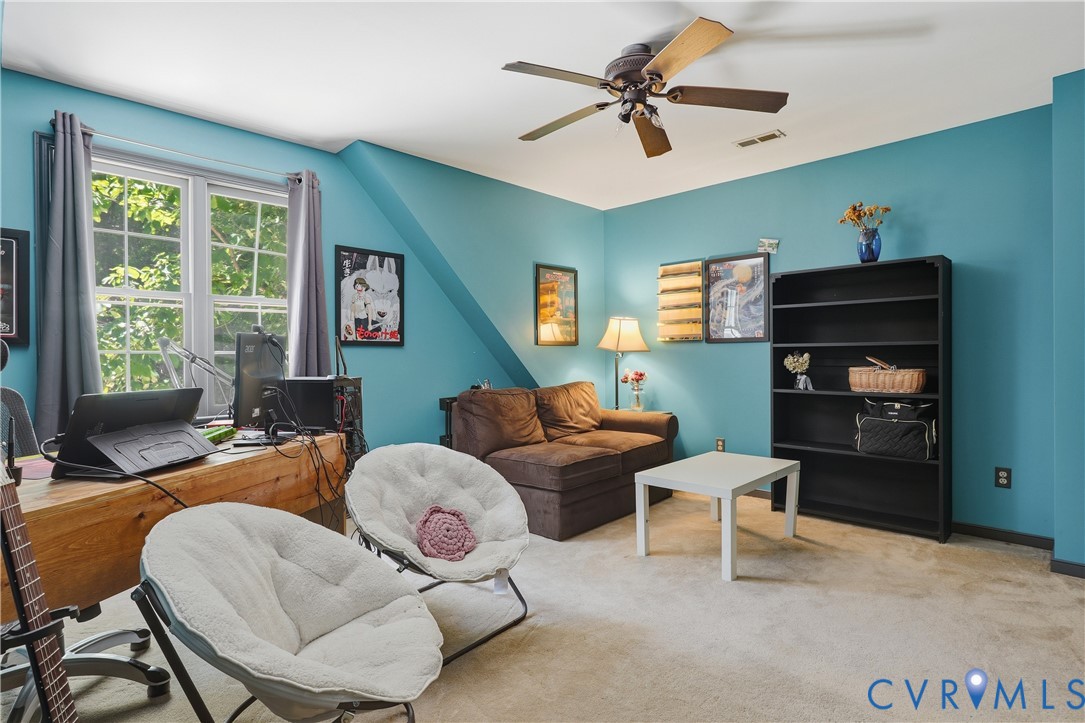 12512 2nd Branch Road Chesterfield, VA 23838 - Photo 33 of 56 a living room with furniture and a window