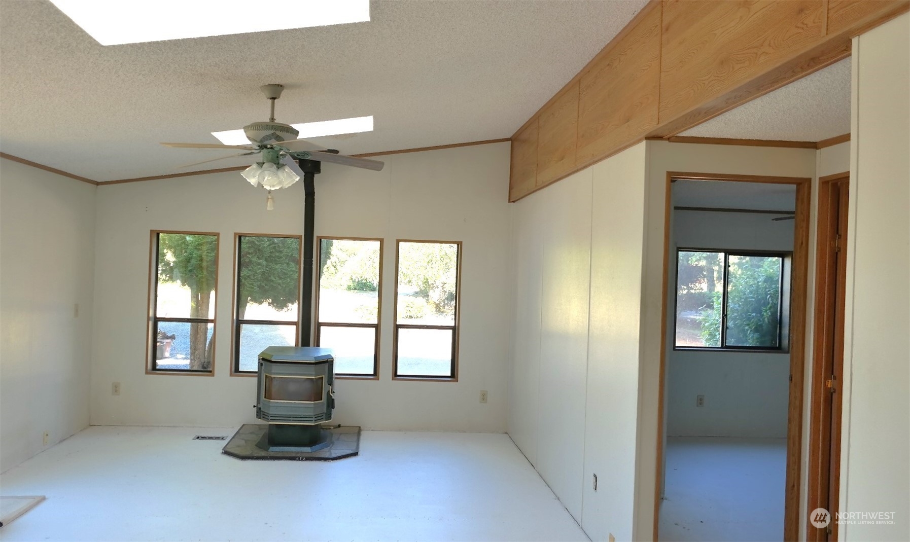 803 Heath Road Sequim, WA 98382 - Photo 5 of 40 a living room with furniture and a window