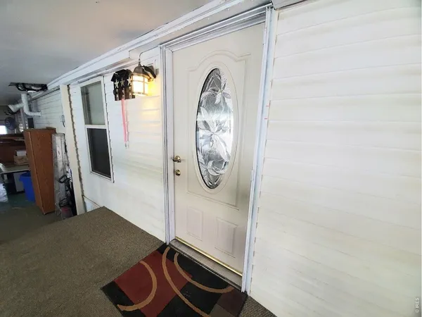 a room with a table and a mirror