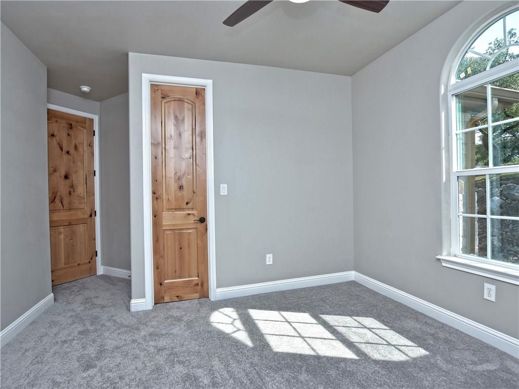 133 Tuscany Way Georgetown, TX 78633 - Photo 26 of 30 an empty room with windows and closet