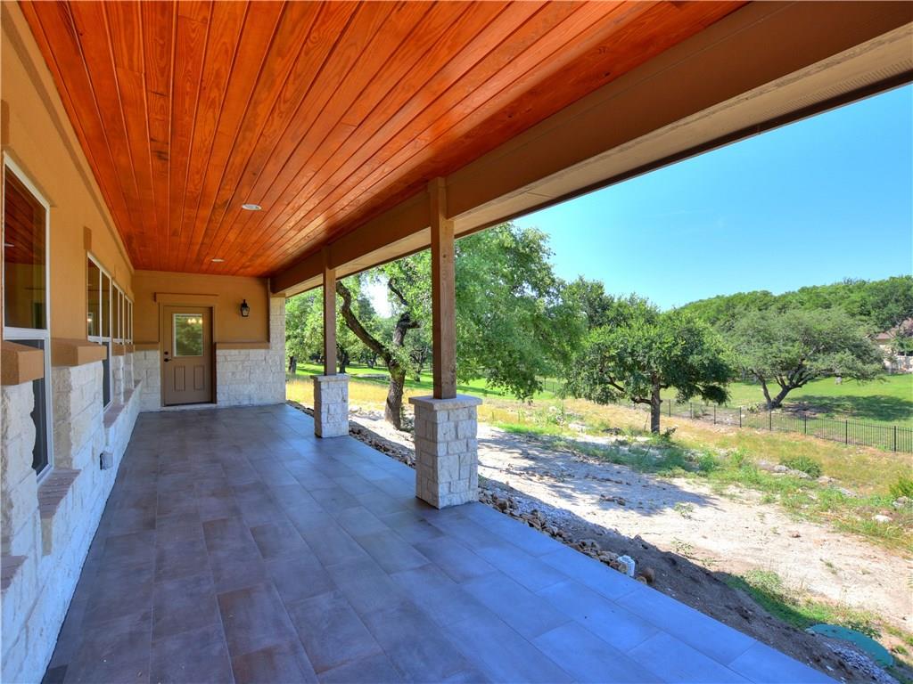 133 Tuscany Way Georgetown, TX 78633 - Photo 30 of 30 a view of a porch with wooden floor and roof