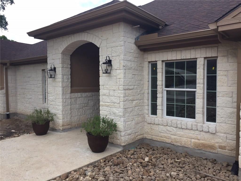 133 Tuscany Way Georgetown, TX 78633 - Photo 3 of 30 a view of entrance of the house with potted plants
