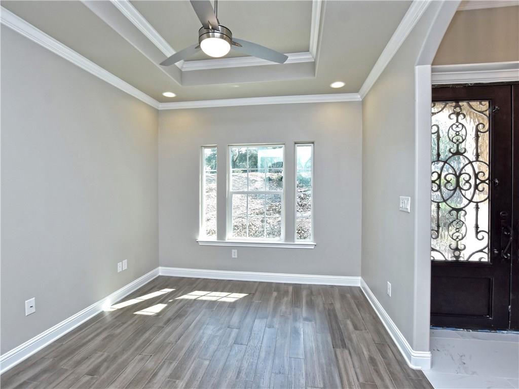 133 Tuscany Way Georgetown, TX 78633 - Photo 9 of 30 a view of livingroom with window