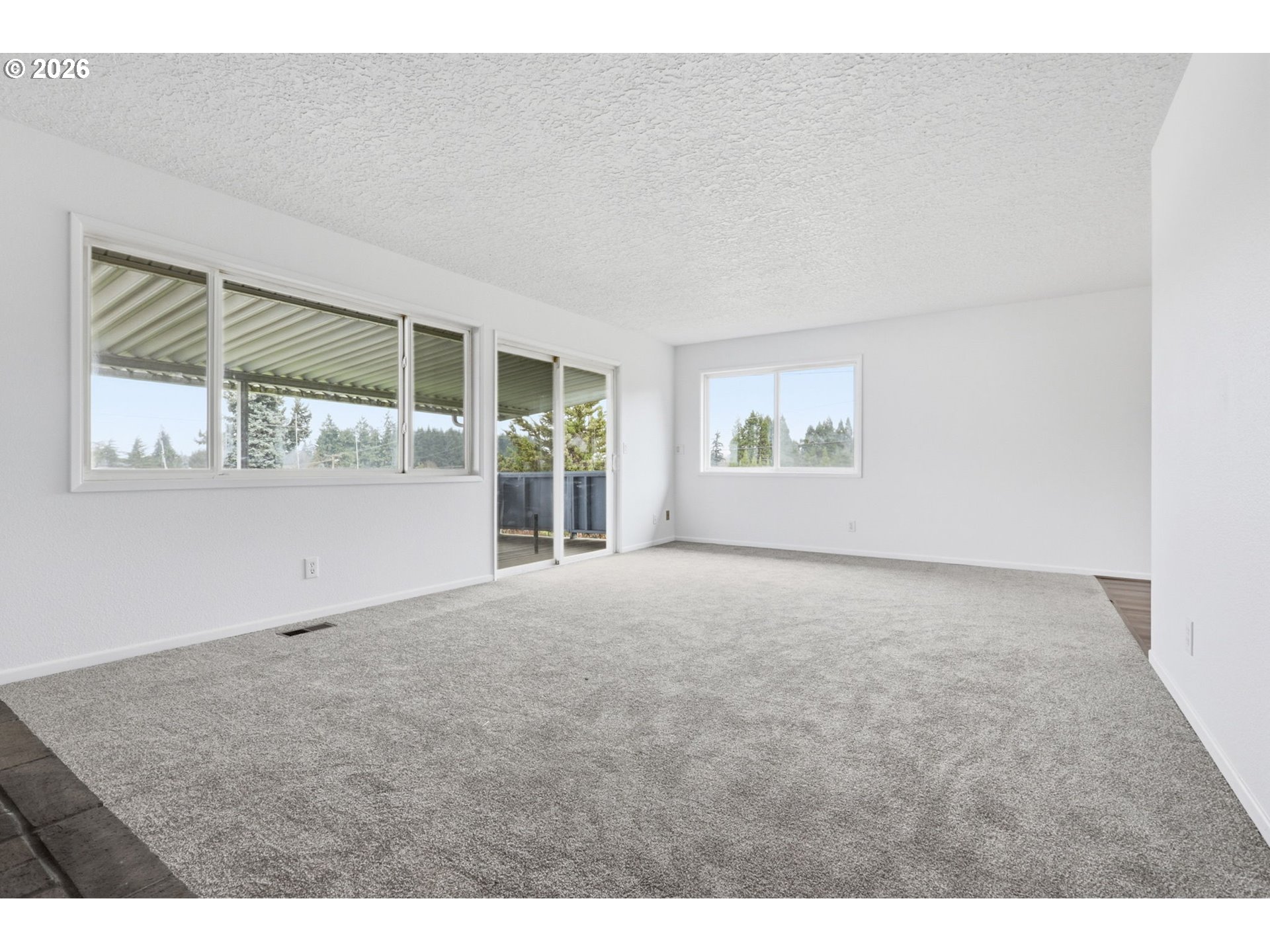 52890 Northwest 7th Street Scappoose, OR 97056 - Photo 15 of 48 an empty room with windows