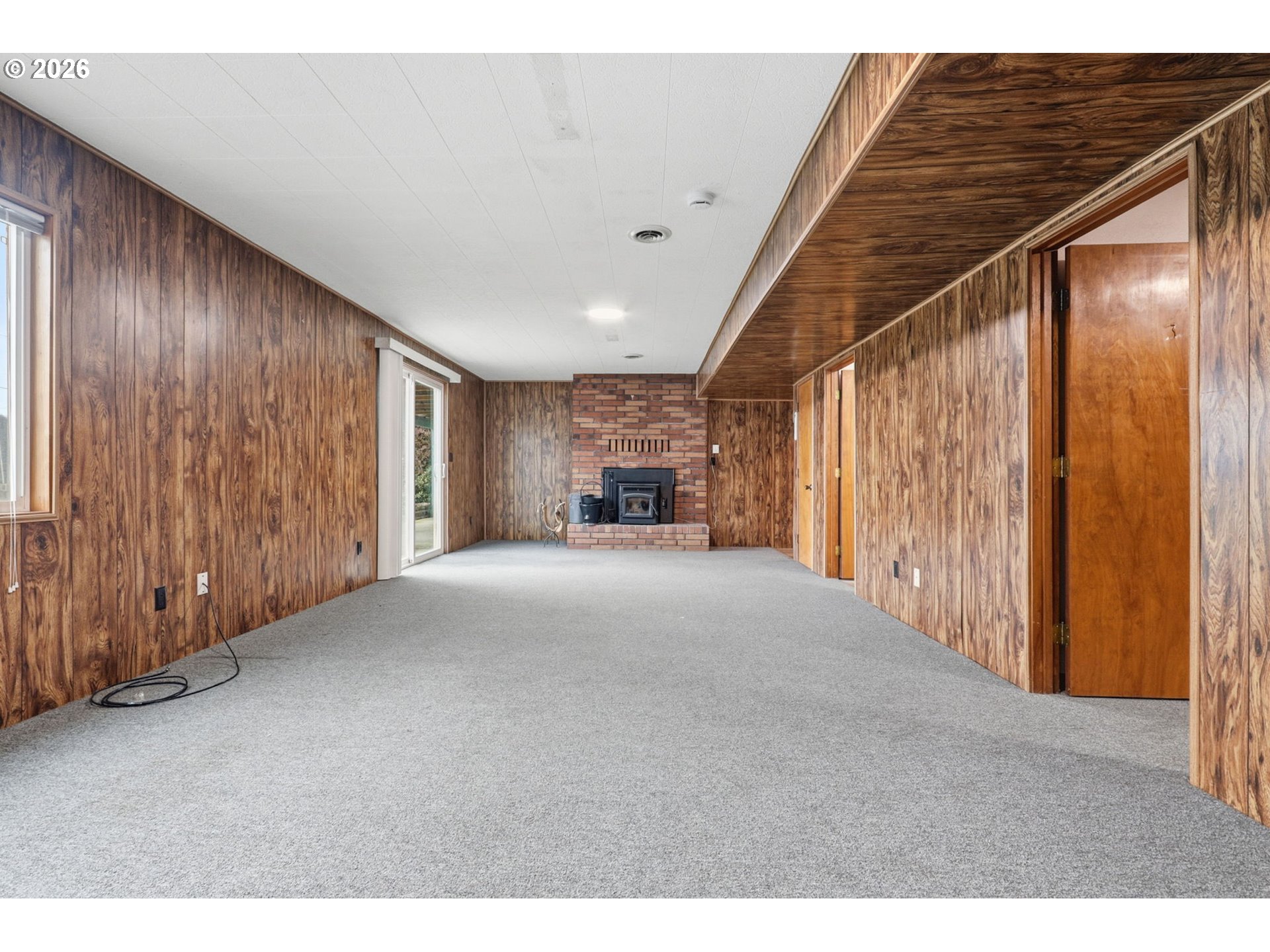 52890 Northwest 7th Street Scappoose, OR 97056 - Photo 26 of 48 a furnished livingroom with furniture and window