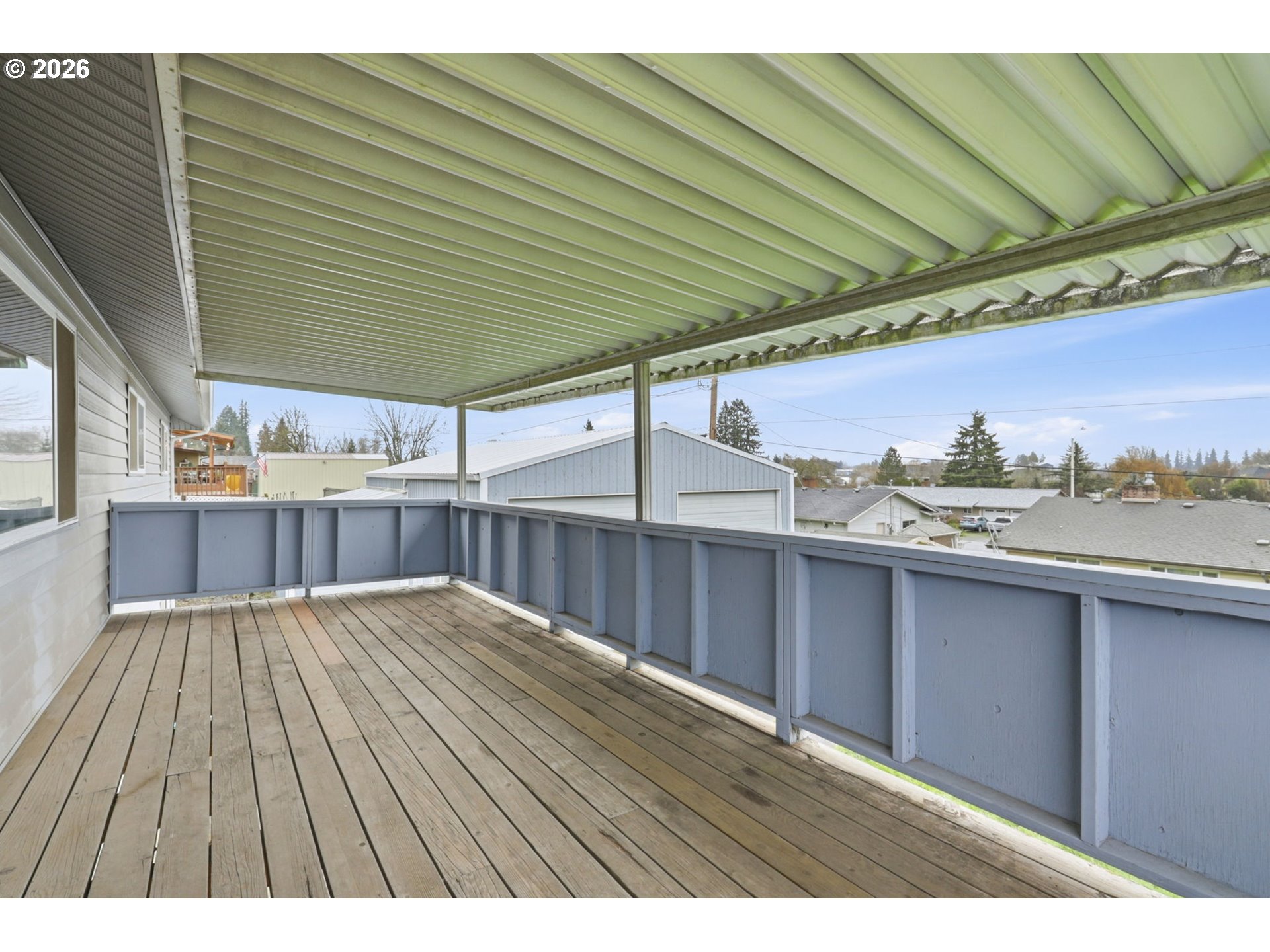 52890 Northwest 7th Street Scappoose, OR 97056 - Photo 32 of 48 a view of balcony with wooden floor