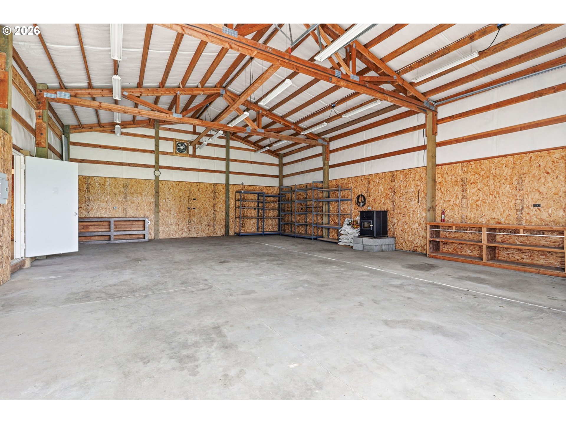 52890 Northwest 7th Street Scappoose, OR 97056 - Photo 34 of 48 a view of a room with wooden walls